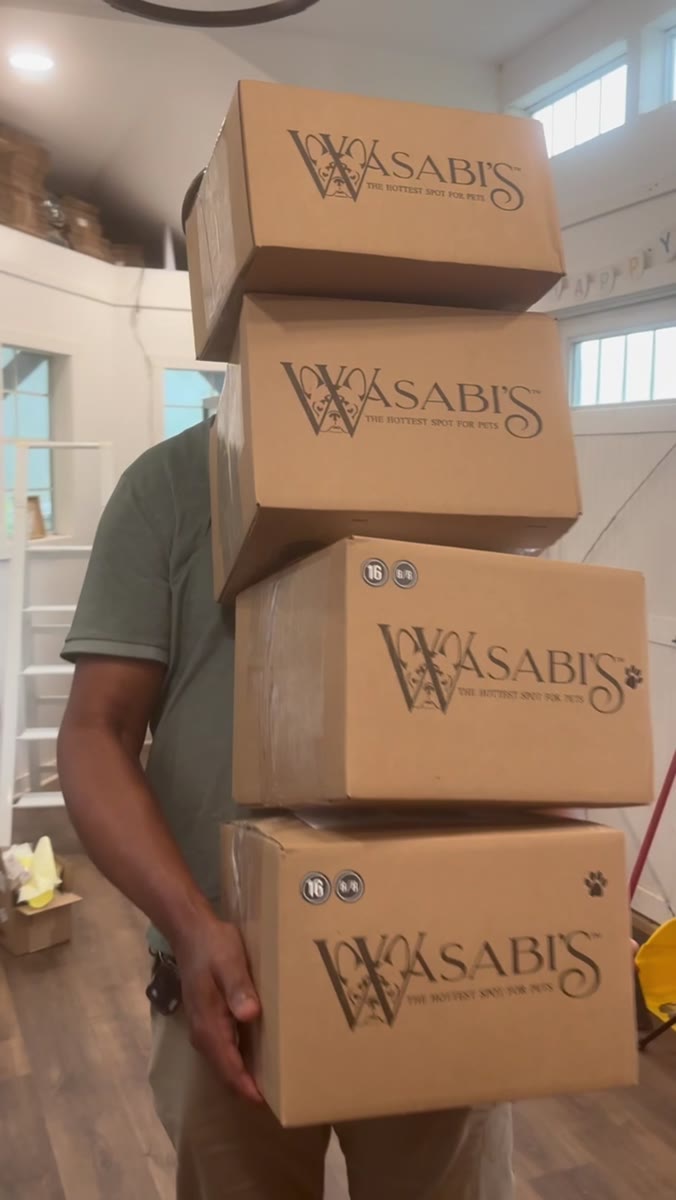 A stack of branded Wasabi’s boxes ready for fulfillment
